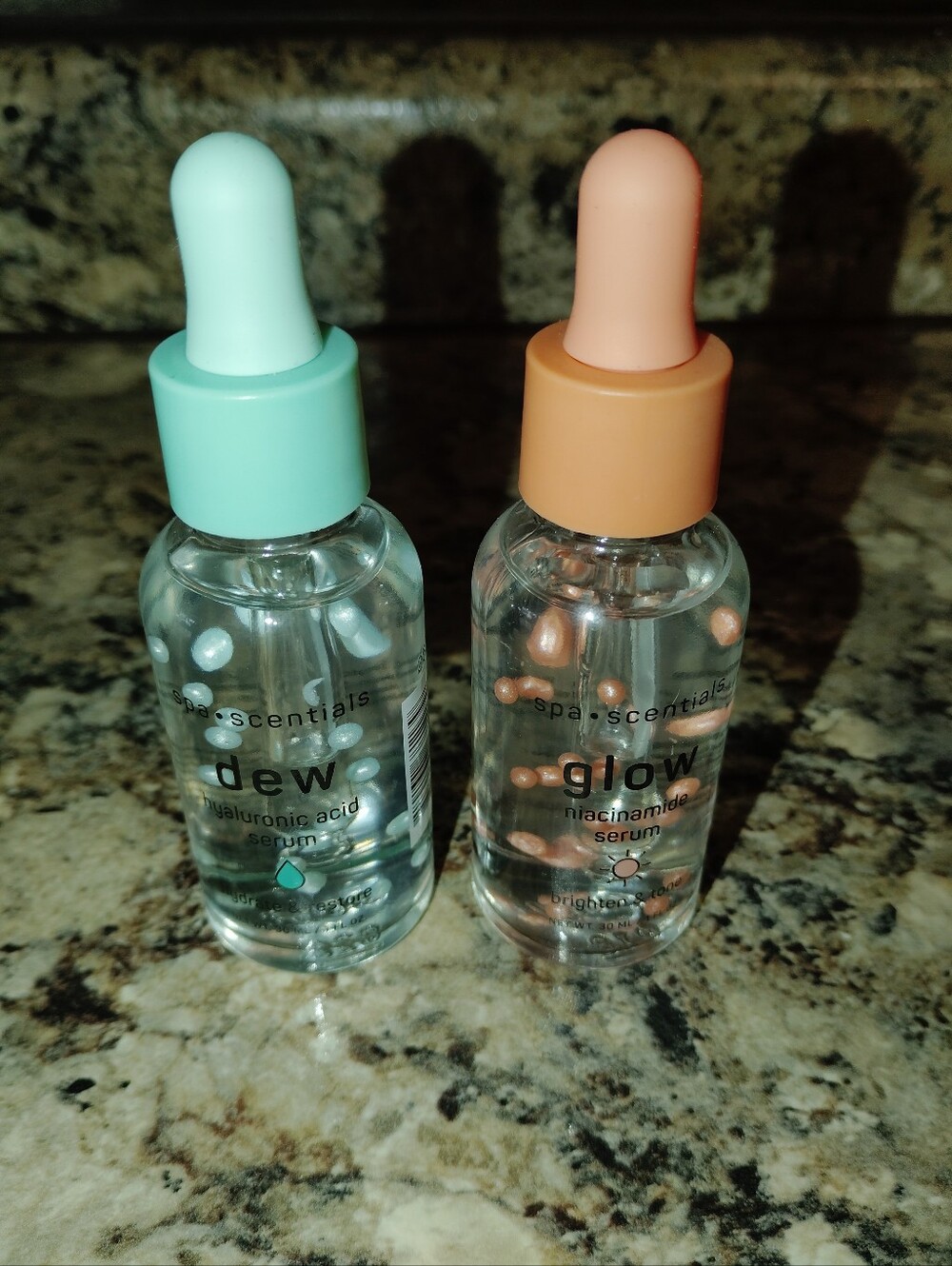 Spa scentials glow and dew brighten and tone hydrate and restore.